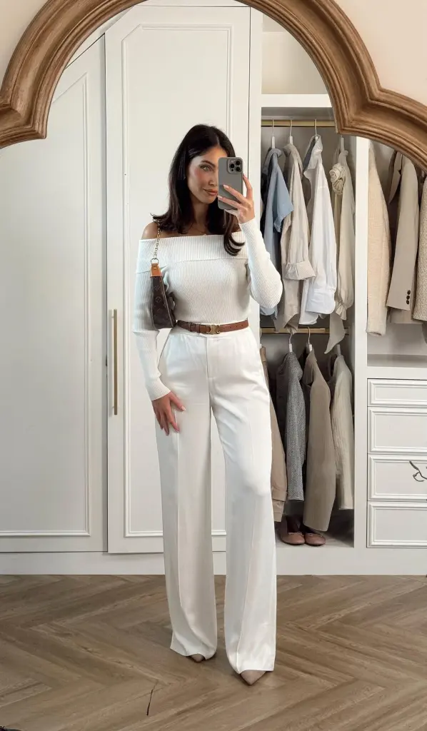 summer work outfit with white ribbed off-shoulder top, white wide-leg trousers, brown leather belt, designer mini bag and nude pointed heels