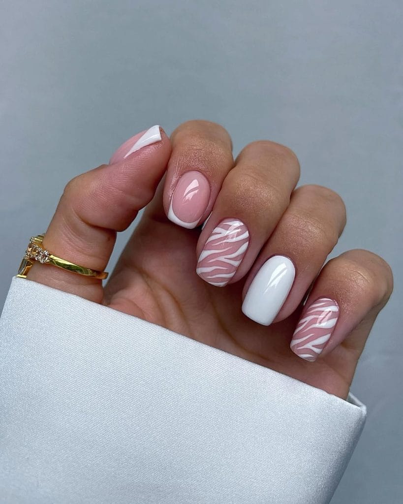 Short square vacation nails with pink and white zebra print design and solid color mix
