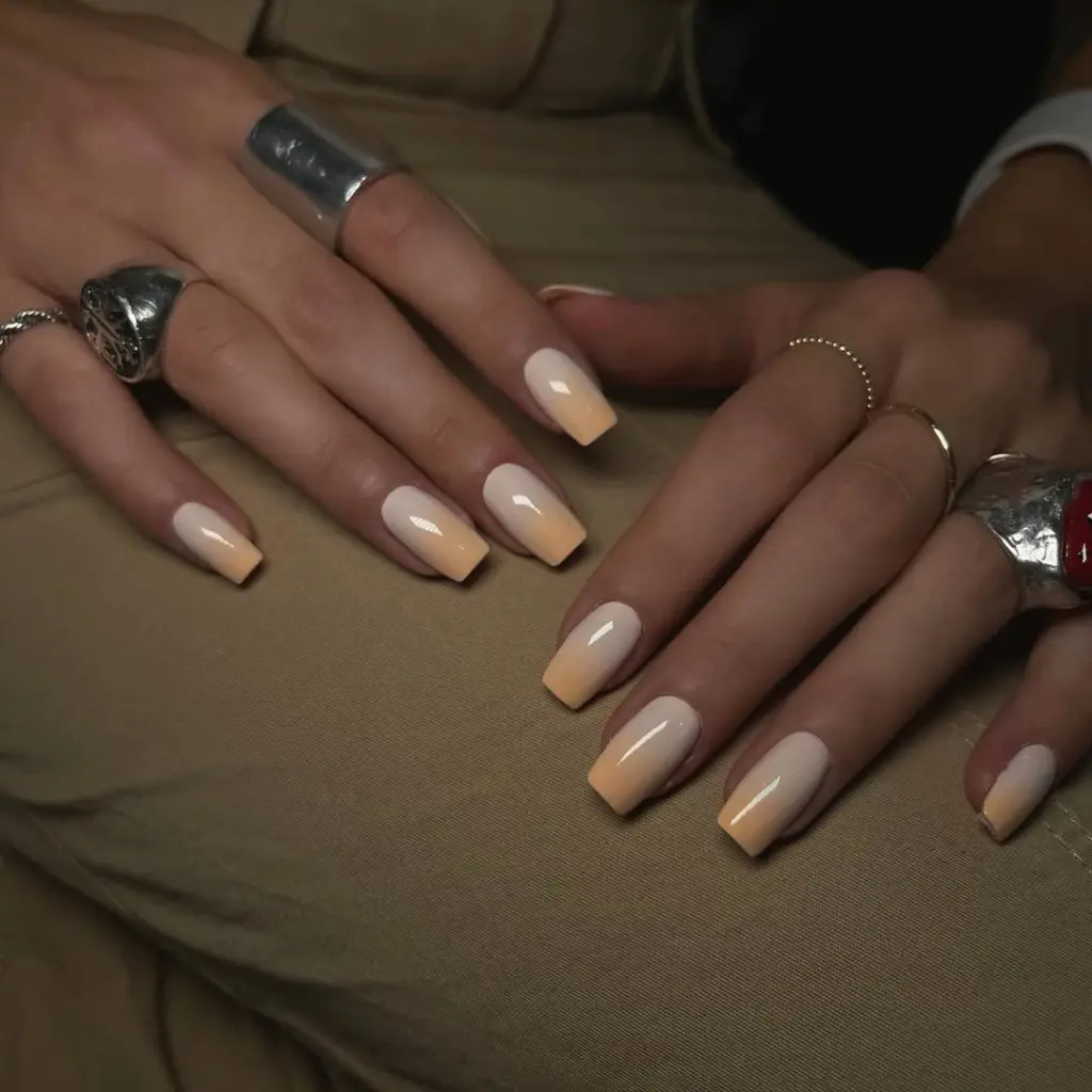 Classy June nails with square shape featuring cream to soft peach ombré gradient
