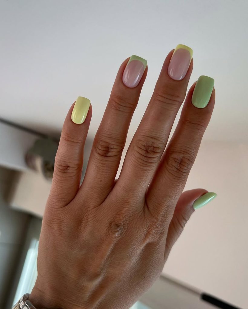 Classy June nails with short square shape featuring lime green and pastel yellow solid colors with milky base and colorful tips 