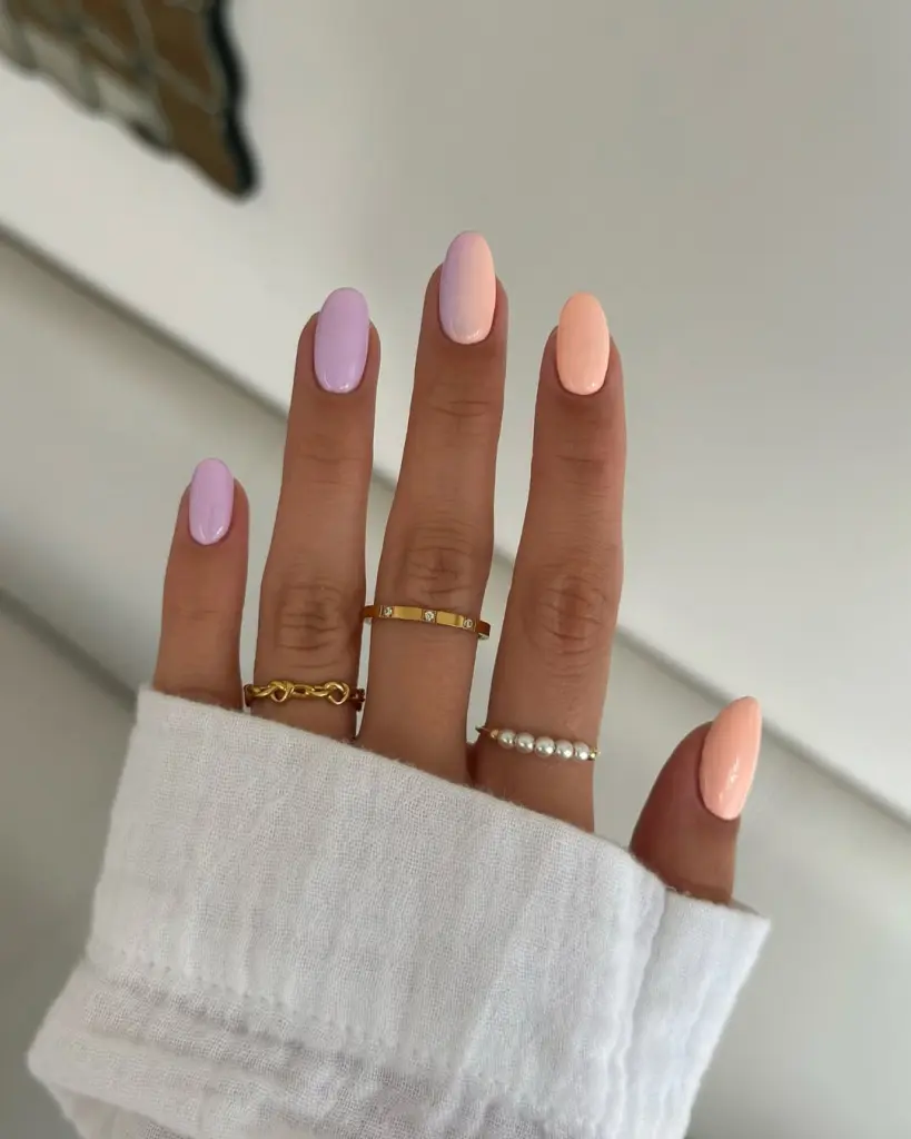 classy summer almond nails with lilac and polish and ombre middle nail

