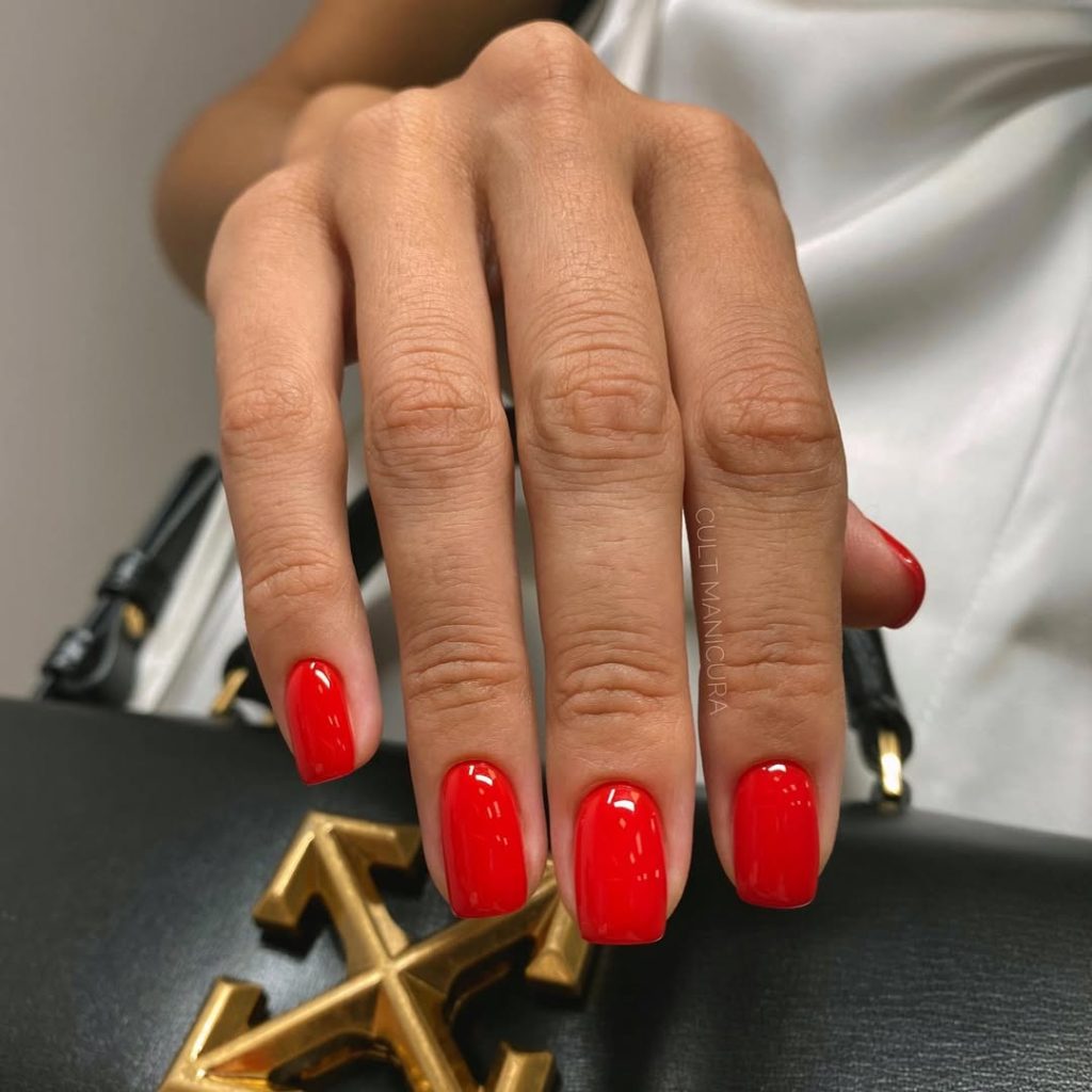 Short square glossy bright red nails
