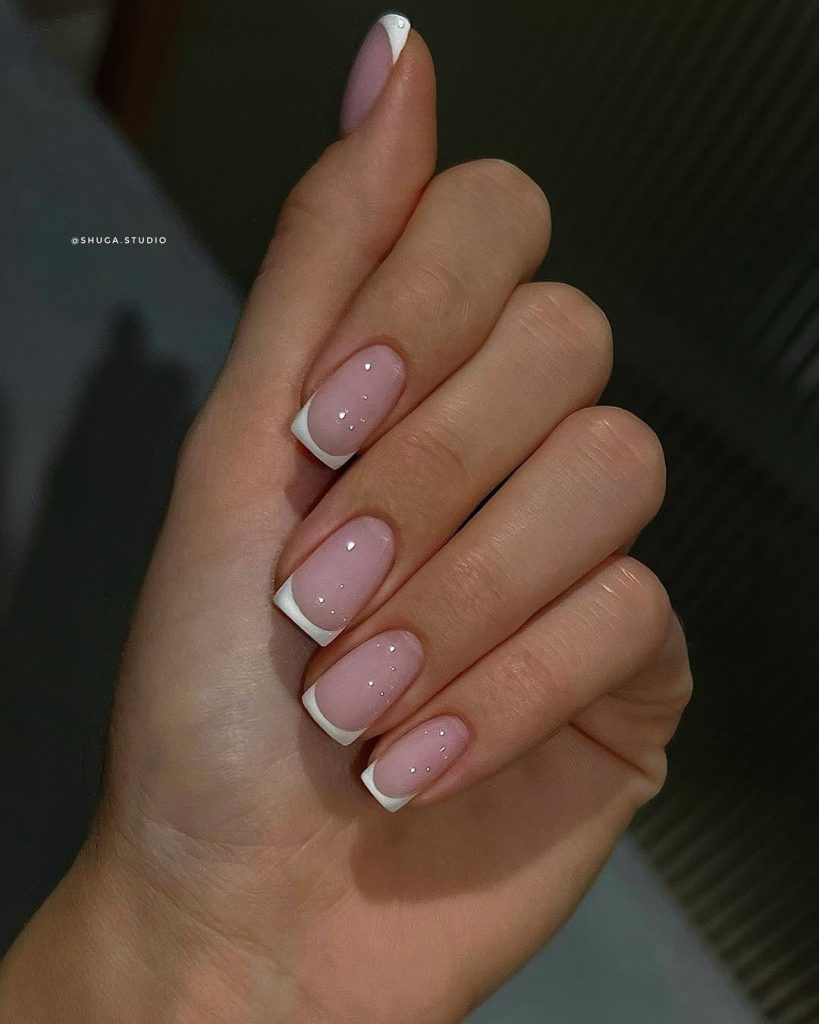 old money square nails with sheer pink base and white French tips
