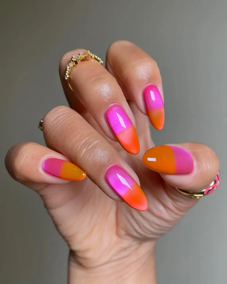 Long almond neon ombré nails with magnetic cat eye effect in hot pink and orange