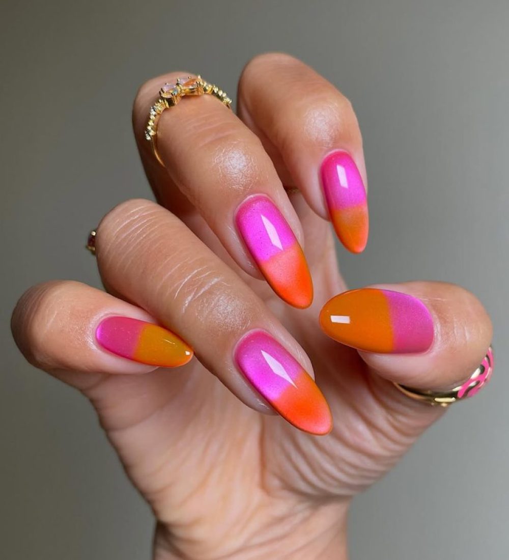 Long almond neon ombré nails with magnetic cat eye effect in hot pink and orange