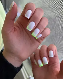  square July nails with white base and bright neon green double French tip lines
