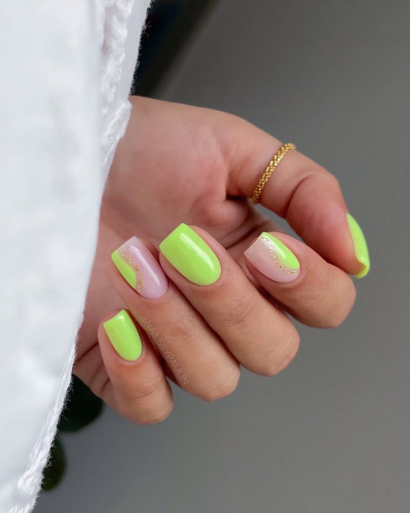 Short summer nails alternating between bright lime green and milky base with thin gold accent curves
