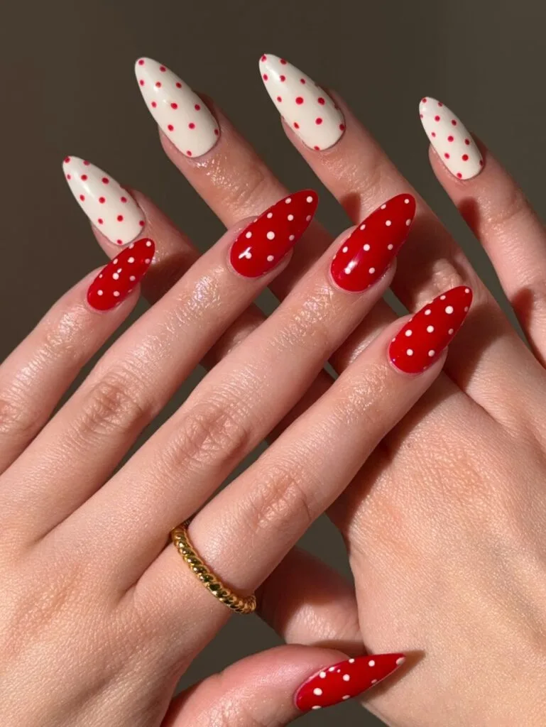Almond simple summer nails alternating white with red polka dots and red with white polka dots