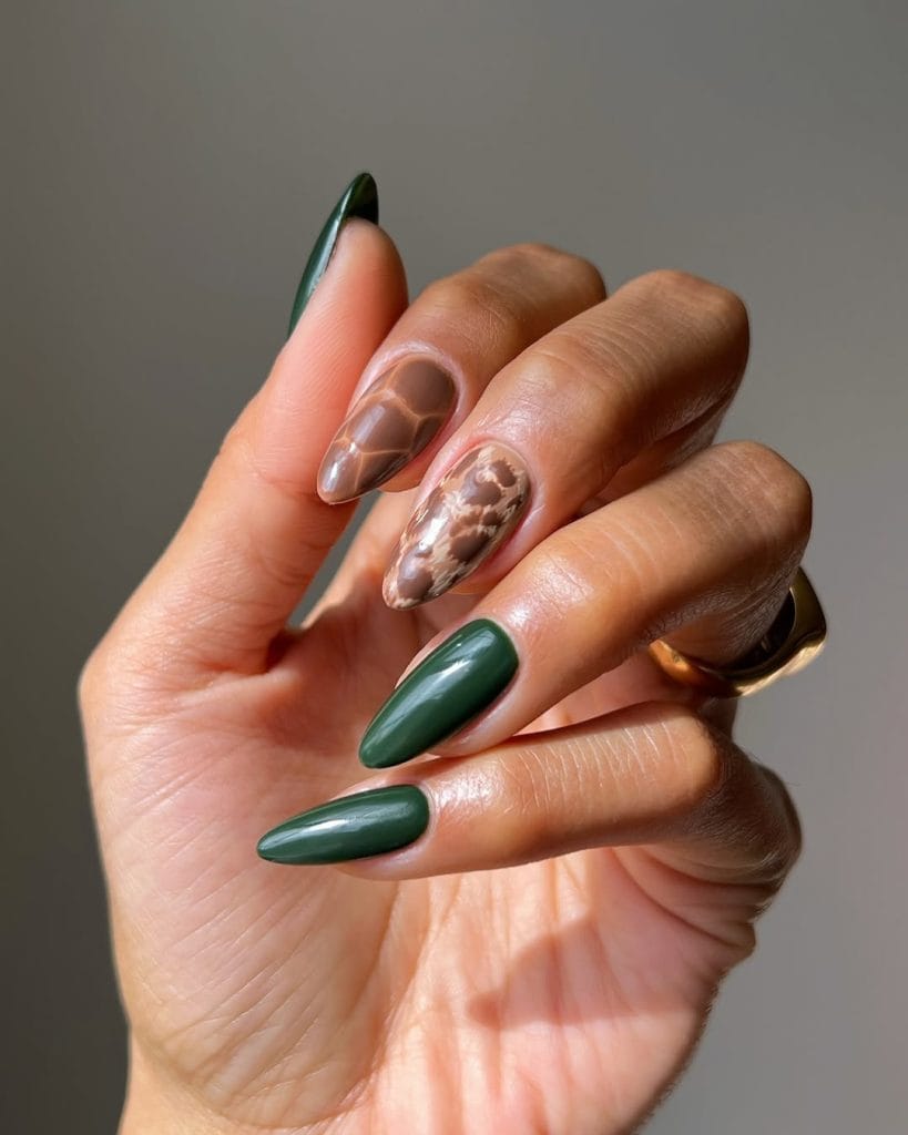 Long almond fall nails with forest green and tortoiseshell brown marble design