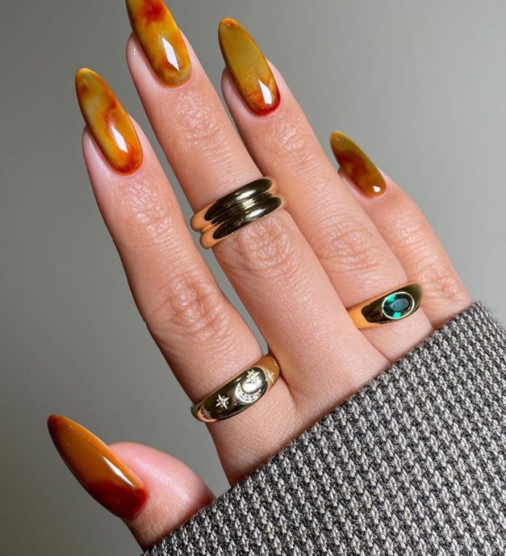 Long almond fall nails with yellow to orange gradient design