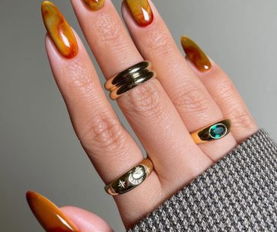 Long almond fall nails with yellow to orange gradient design