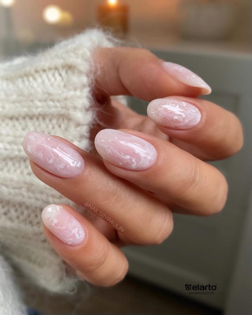 oval fall nails with milky pink marble design
