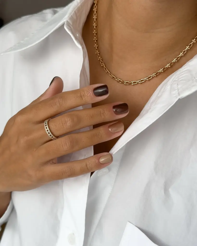 Short fall nails in mixed brown shades - chocolate, beige, and medium brown with glossy finish