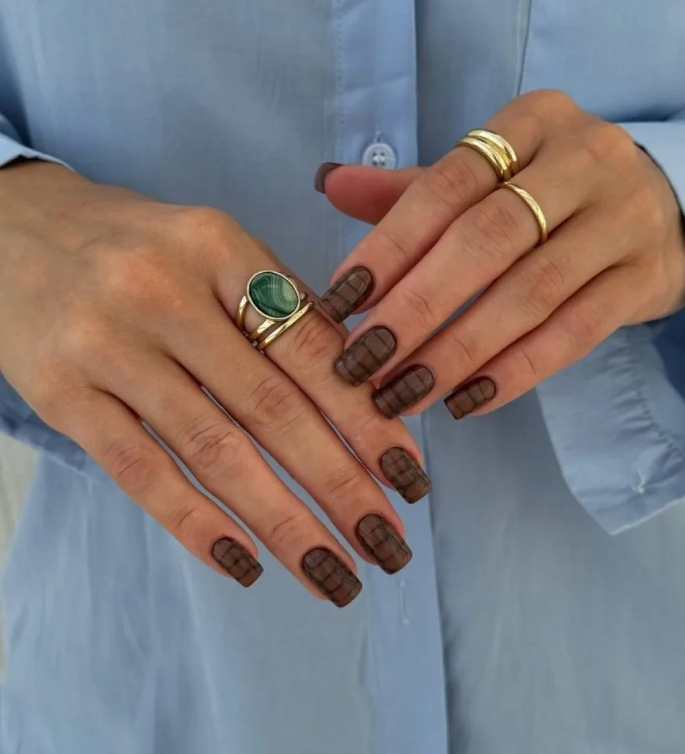 Short brown snake print pattern nails for fall