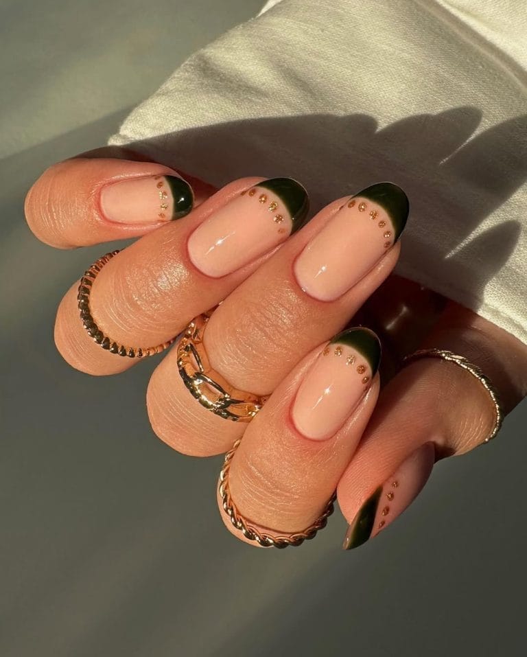 Classy fall nails with green French tips and gold dots