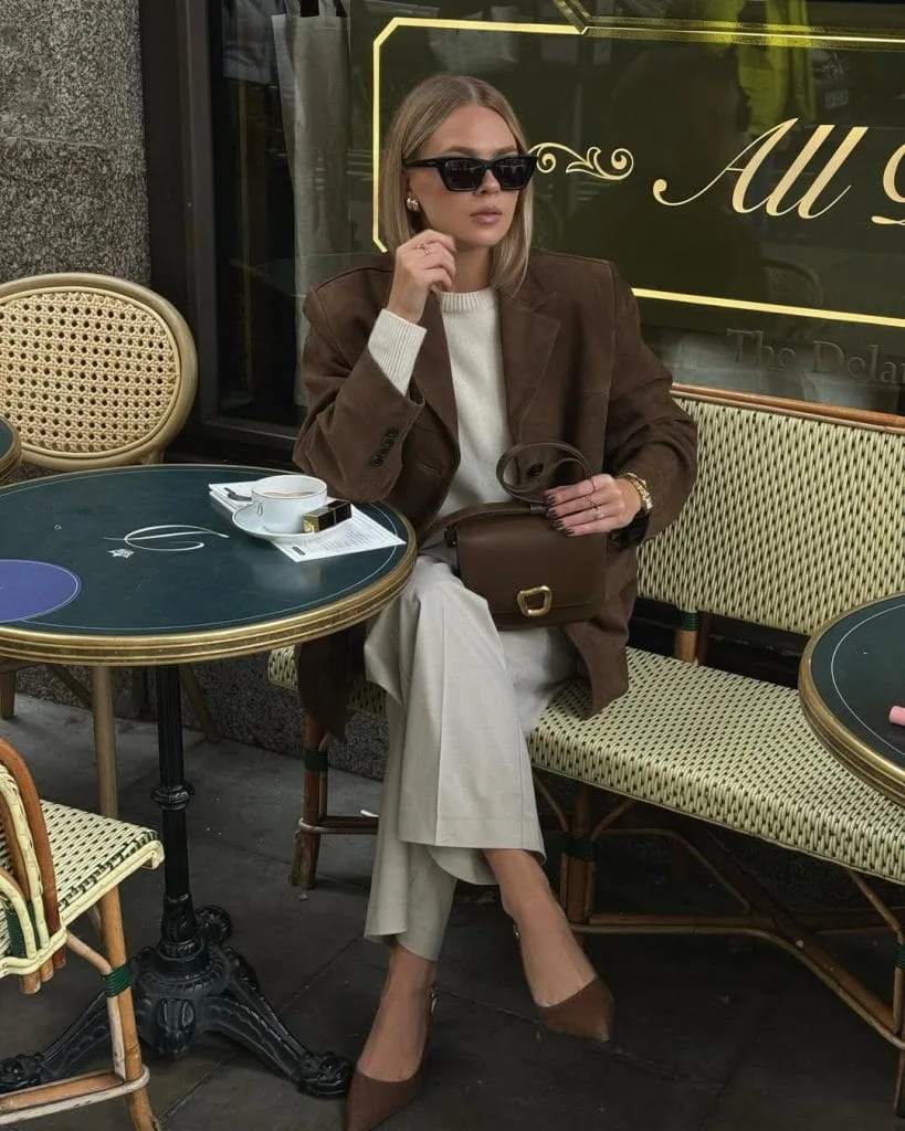 Sophisticated old money outfit with brown suede blazer, cream sweater, trousers and matching heels