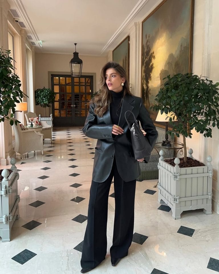 Elegant old money outfit with black oversized blazer, wide-leg trousers and turtleneck