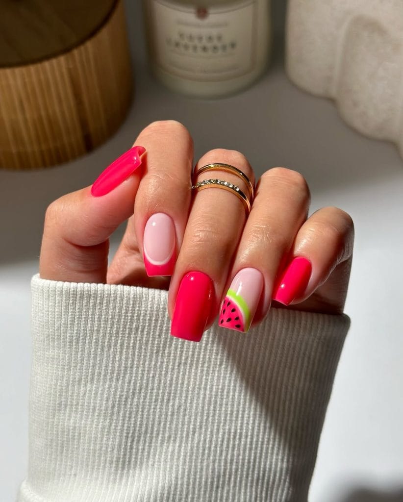 square August nails with hot pink and soft pink base featuring watermelon accent nail design