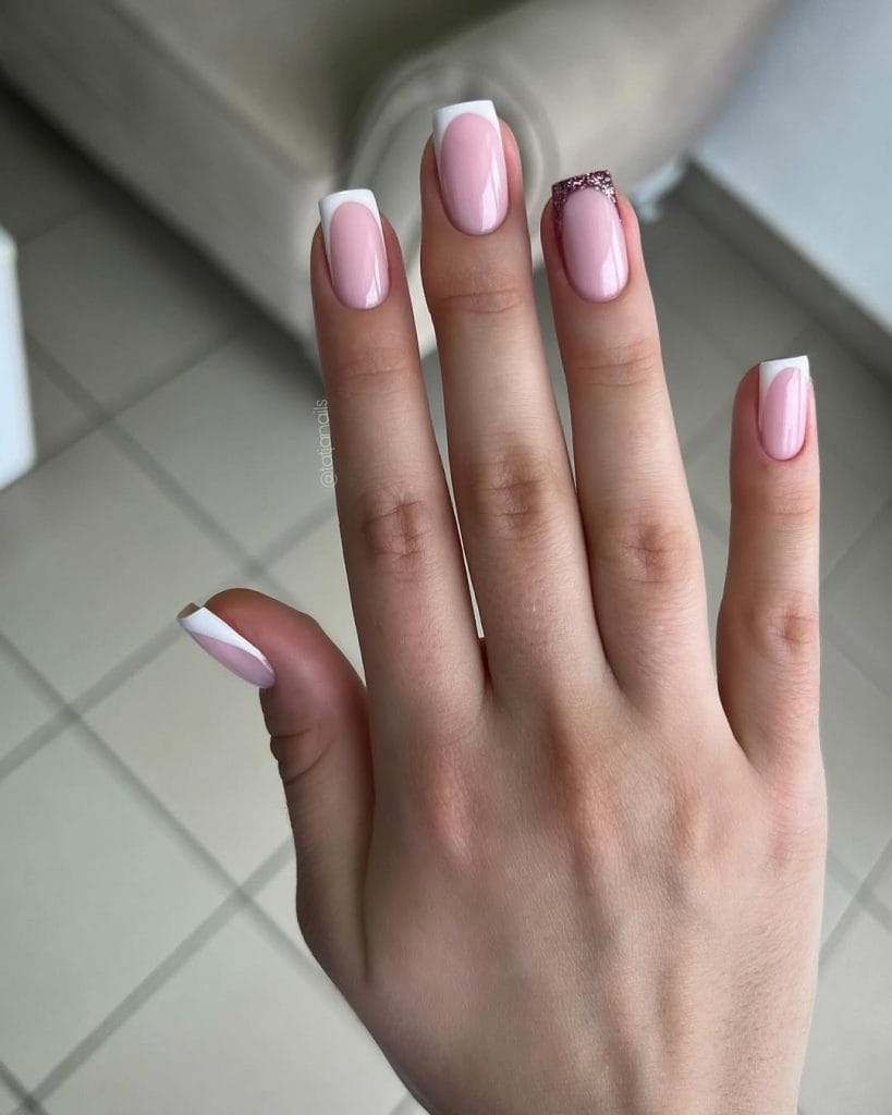 Pink and white fall French tip nails with rose gold glitter accent nail
