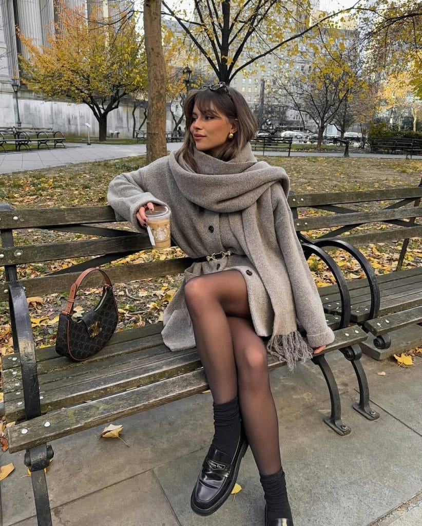 Parisian fall outfit with oversized grey coat, classic black loafers, crew socks
