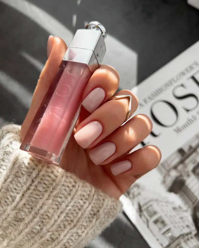 Short fall nails in milky pink with translucent finish and square shape