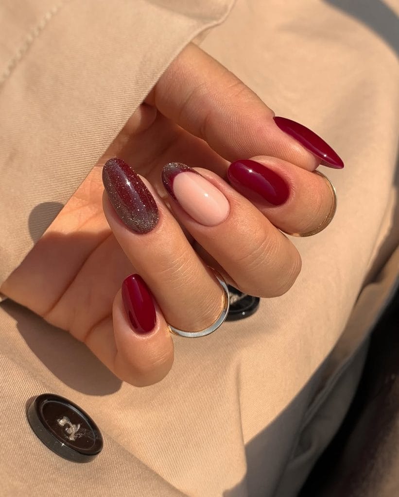 Classy fall nails with burgundy and shimmer accents
