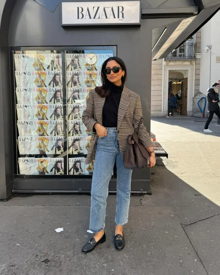 Effortlessly Chic fall outfit with brown plaid oversized blazer, black turtleneck, cropped straight-leg jeans, black horsebit loafers and grey shoulder bag