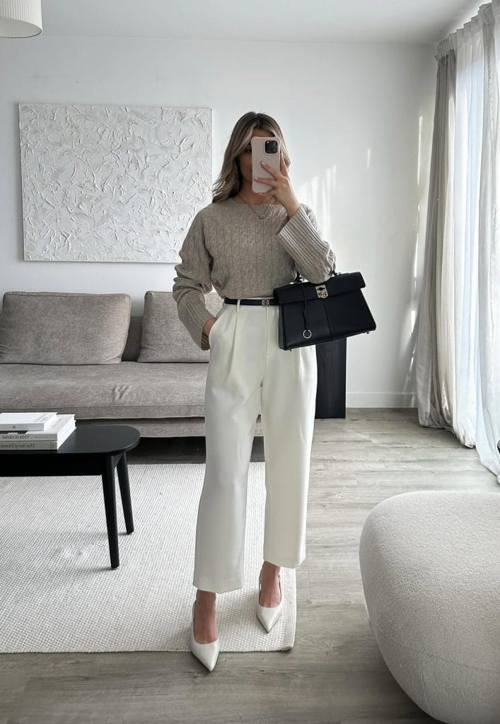 Comfortable fall work outfit with gray cable knit sweater, cream wide-leg trousers and black belt for office style