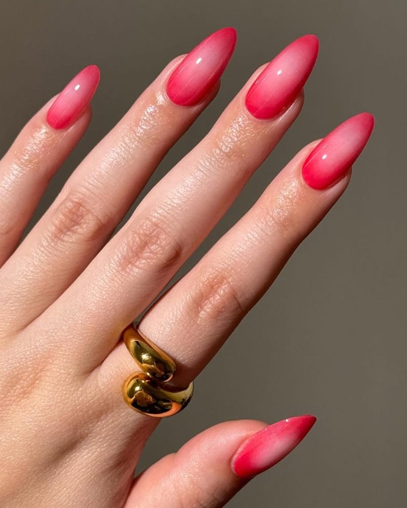 Long almond August nails with cherry red to pink gradient effect
