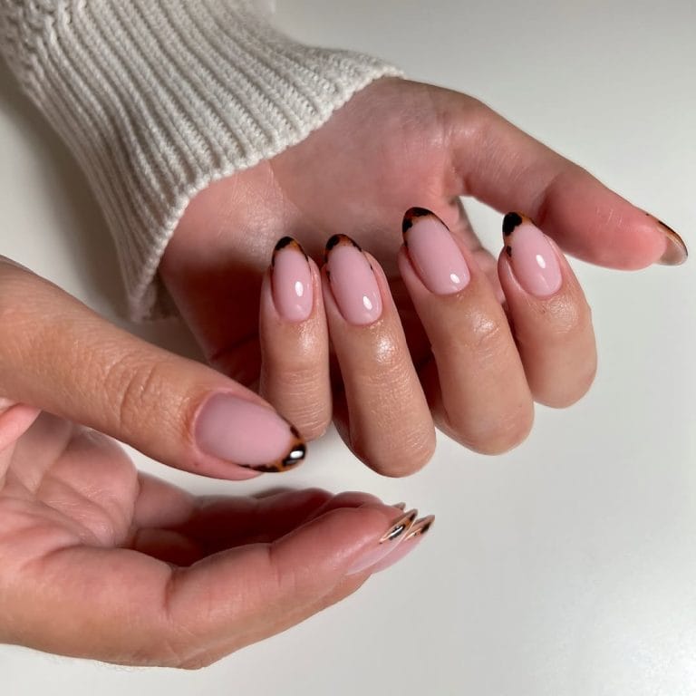 Tortoiseshell fall French tip nails with shell pattern tips on pink base