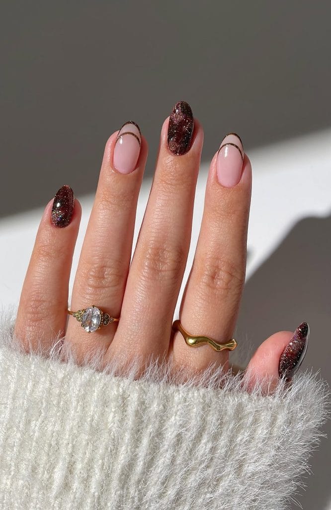 Brown sparkle mosaic September nails with nude French outline accents