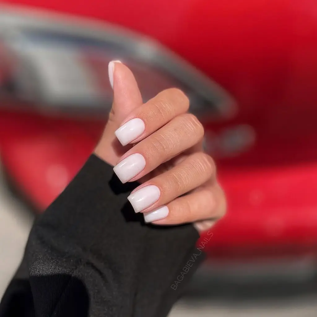 Milky white neutral nails on square shape with clean finish