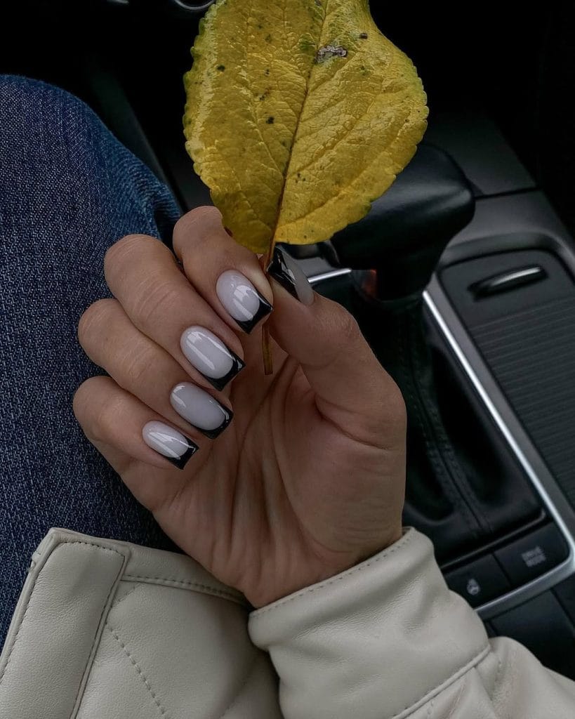 Black fall French tip nails on square shaped nails with milky base