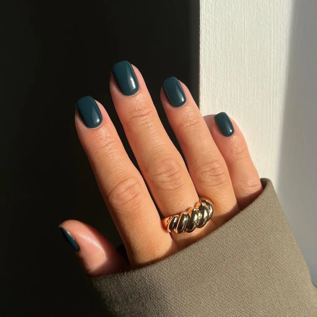 Short fall nails in deep teal blue-green color with glossy finish and square shape