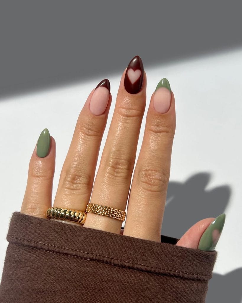 Mixed fall nails with French tips and heart designs
