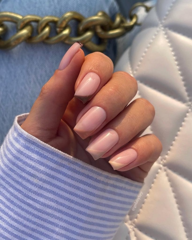 Diagonal fall French tip nails with angled cream, beige and brown tips on square nails