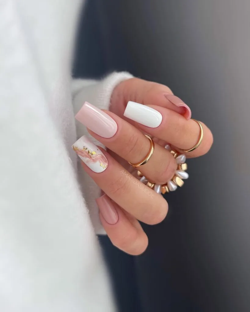 neutral nails with pink marble gold foil accent solid white and nude pink square shape