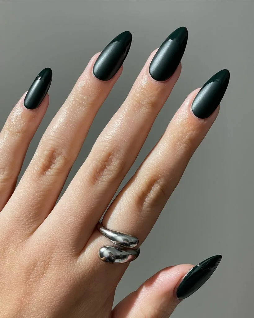 Dark green nails with matte base and glossy French tips in same shade