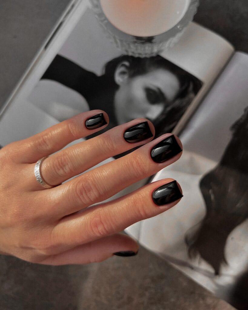 short nails with glossy solid black polish, October nail ideas