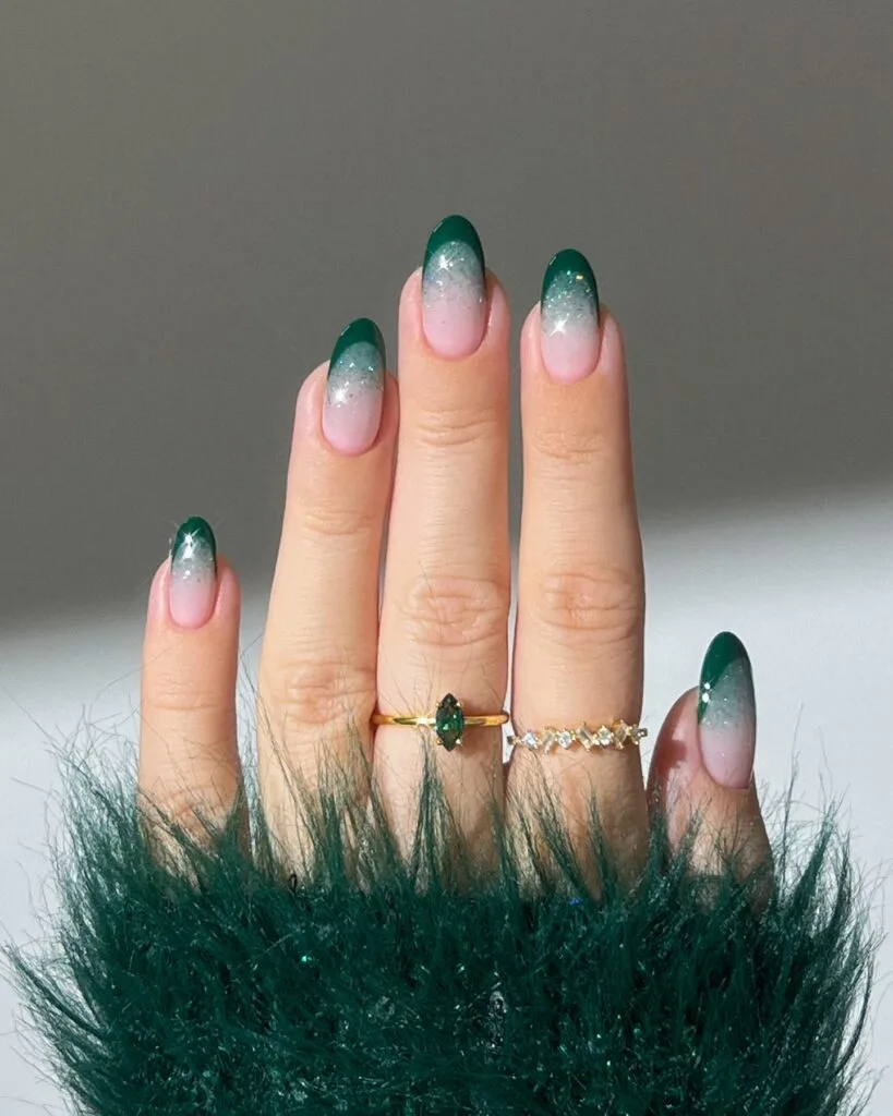 Pink-to-dark green ombré nails with glitter fade