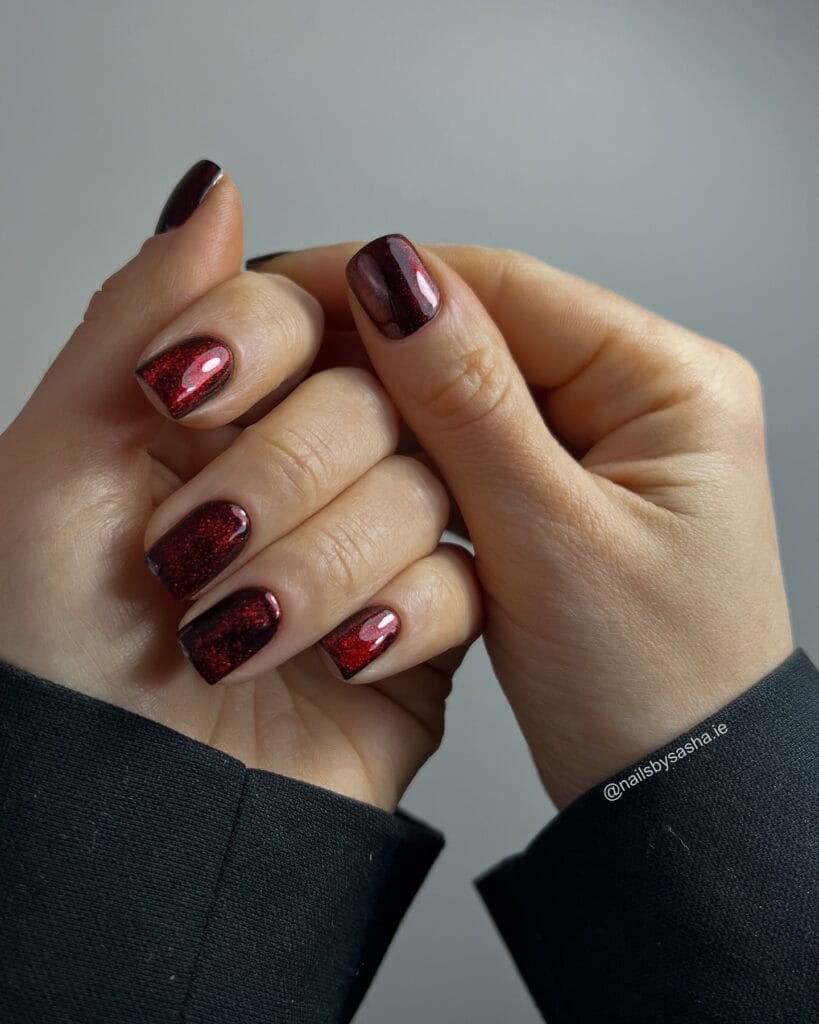 Burgundy glitter nails with square shape