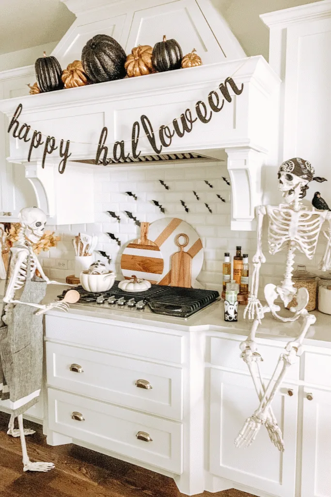 Halloween decor ideas with skeleton in kitchen and banner