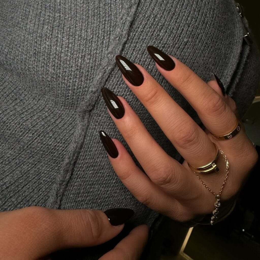 long almond nails with glossy dark brown polish, October nail ideas