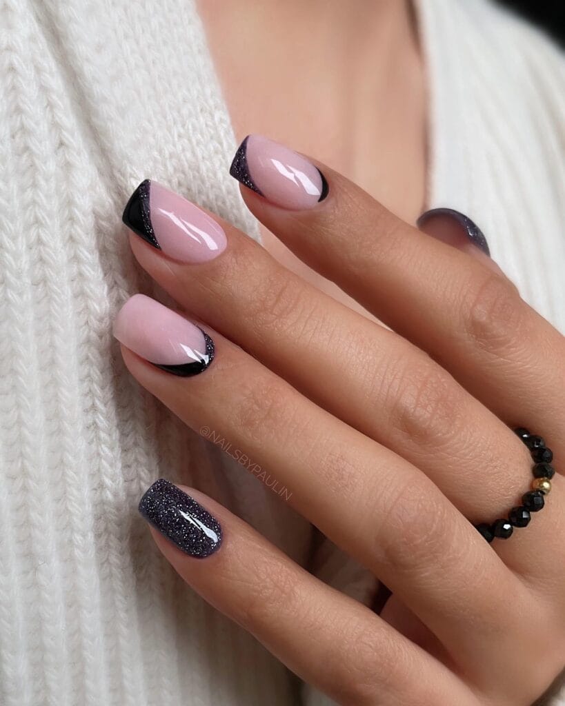 milky pink nails with black glitter French tips and accent glitter nail, fall nail design