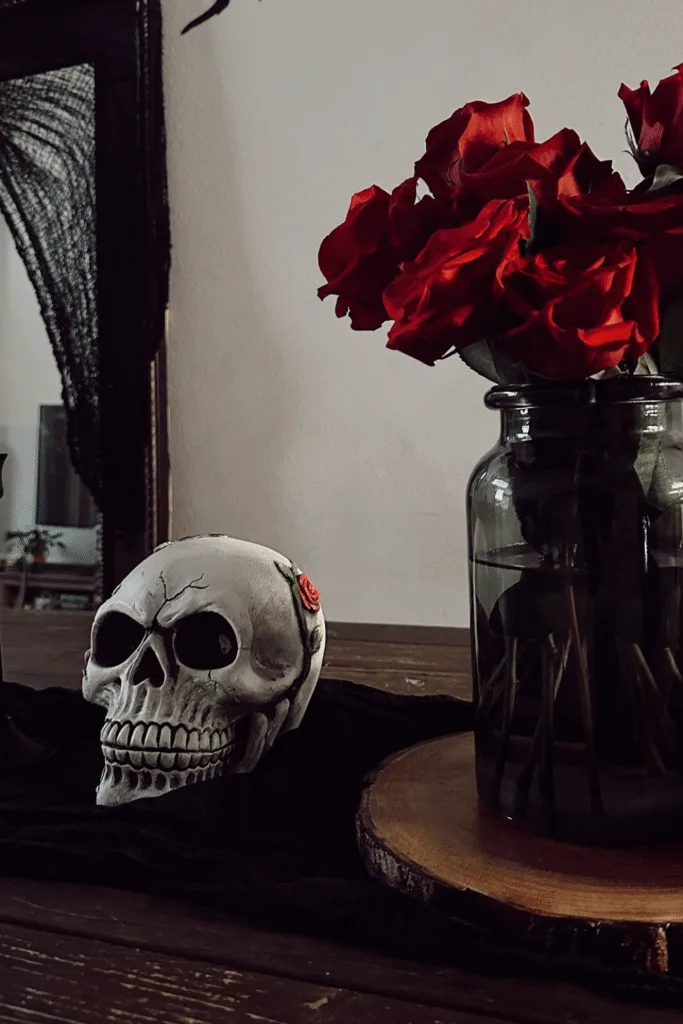 Skull and red roses Halloween decor on table