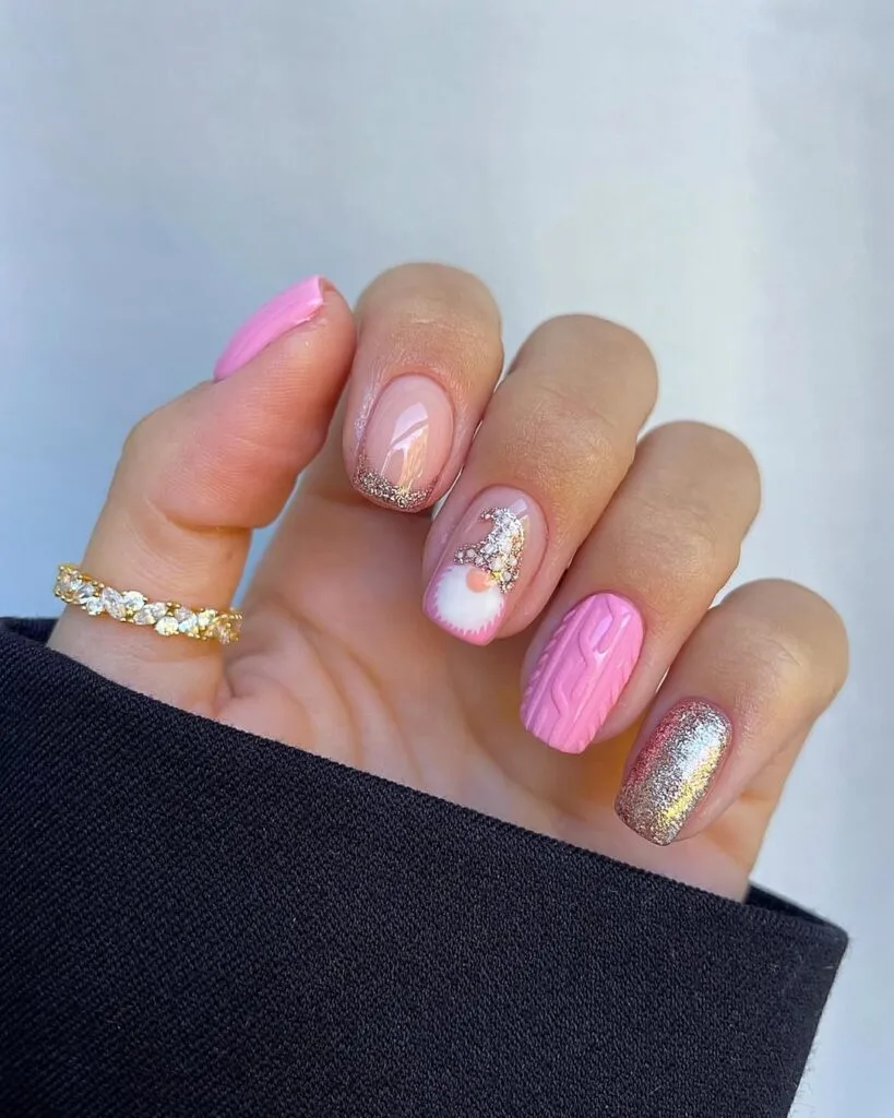 short pink nails with gold accent, 3D cable knit, and a sparkly gnome design, Christmas nails