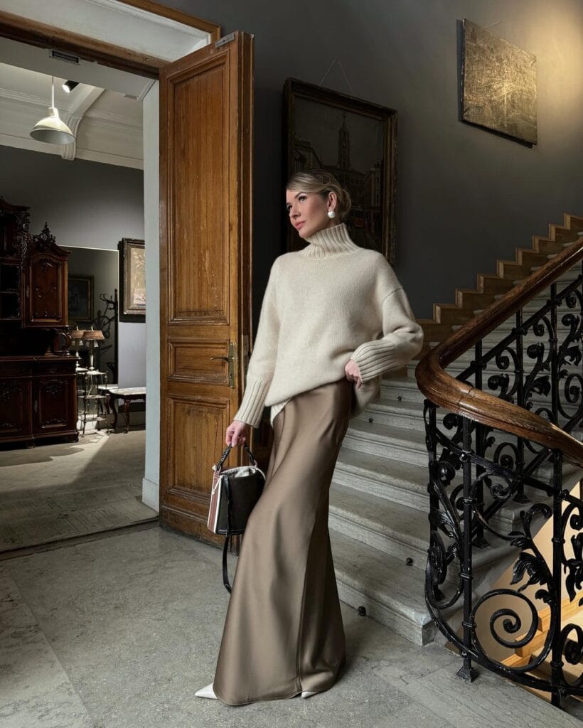 winter date outfit with cream turtleneck sweater, taupe satin maxi skirt
