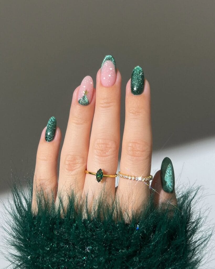 green glitter nails with pink accent and Christmas tree art, festive holiday nails