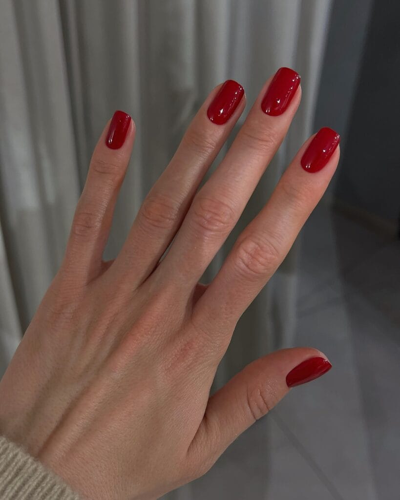 glossy red nails, December nail ideas
