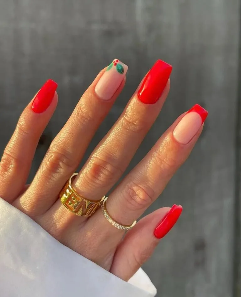 square nude nails with bold red French tips and tiny holly leaf accent, Christmas nails